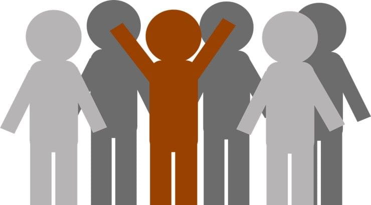 one figure standing out in a crowd