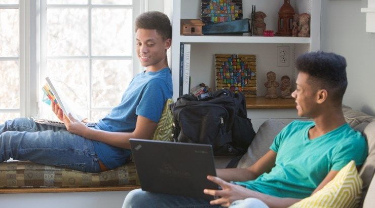 brothers studying in bedroom