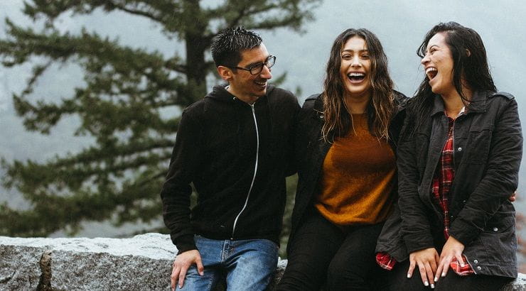three friends laughing