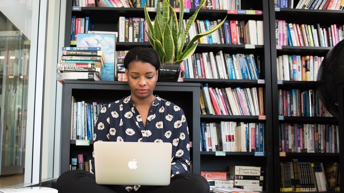 woman on computer in the library