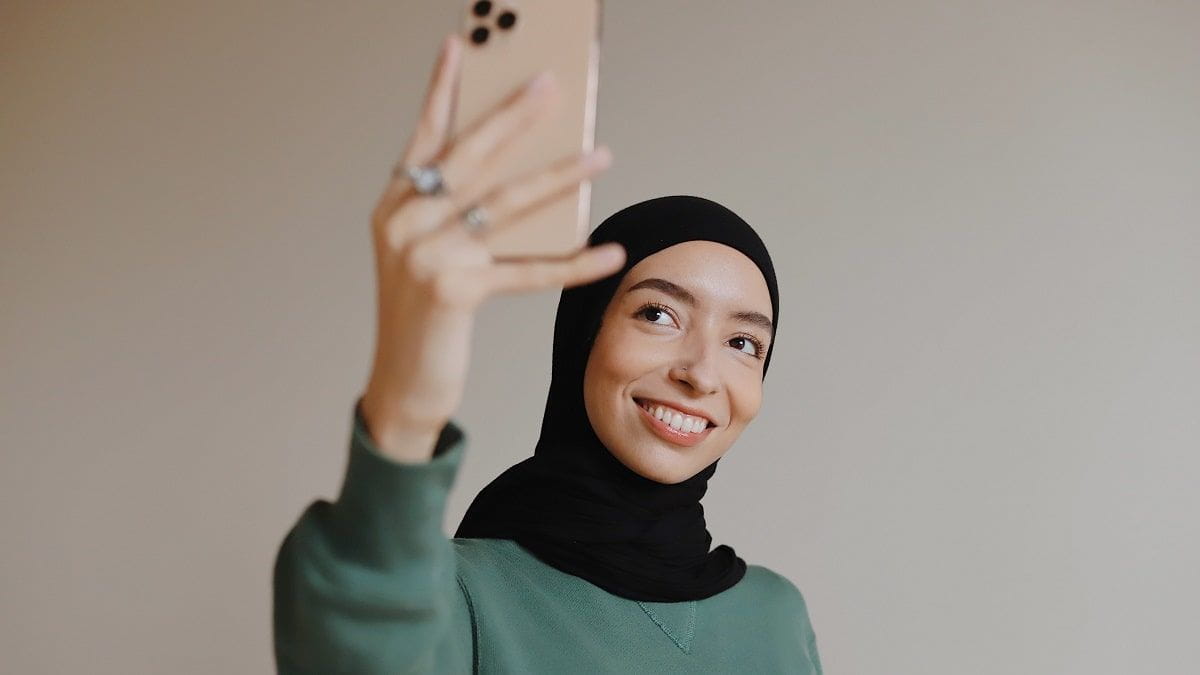 woman using phone to record video