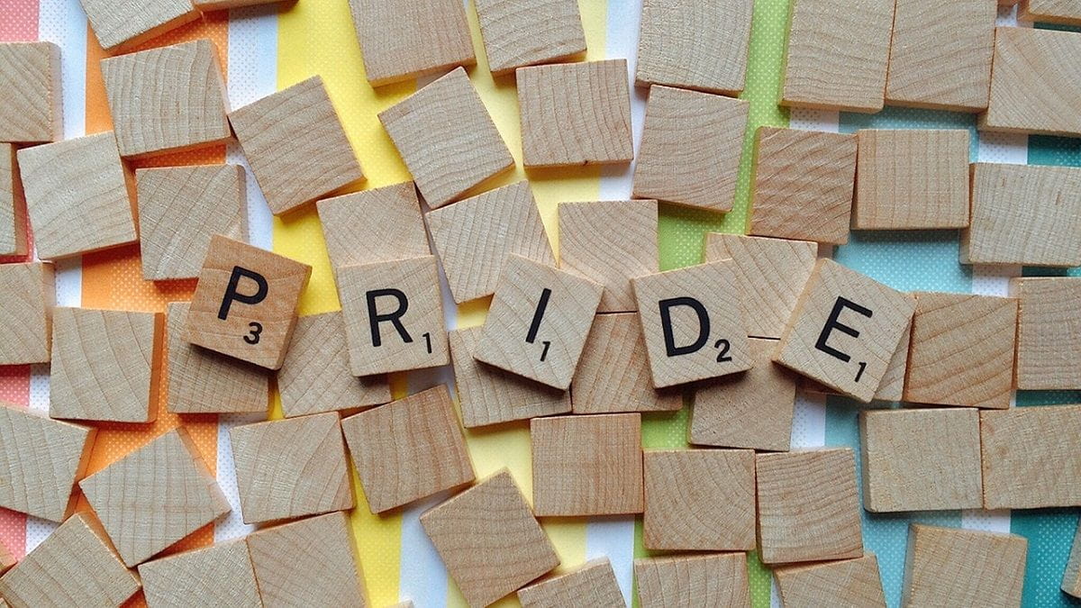 Scrabble tiles spelling pride