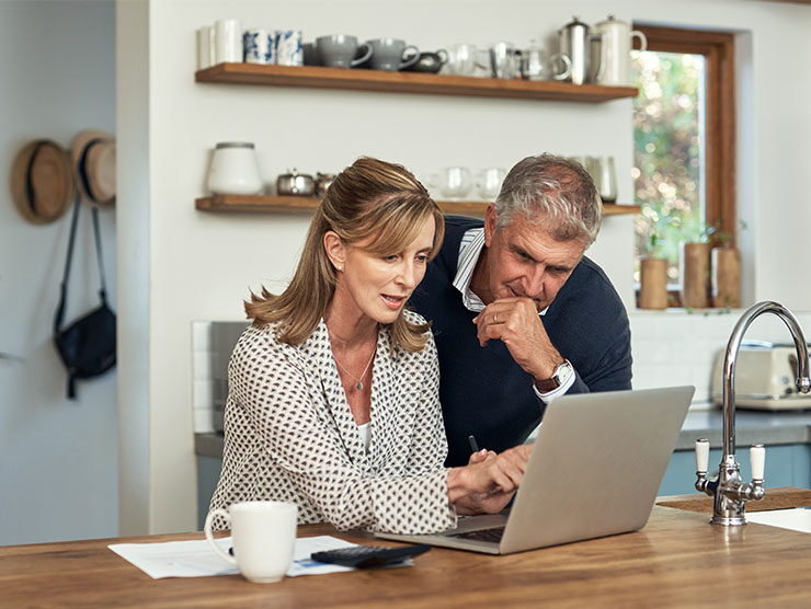 Parents looking at a screen.